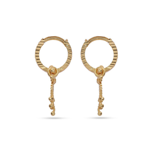 Pair of gold hoop earrings with dangling elements on a white background