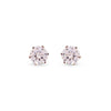 Pair of round stud earrings with speckled design on a white background
