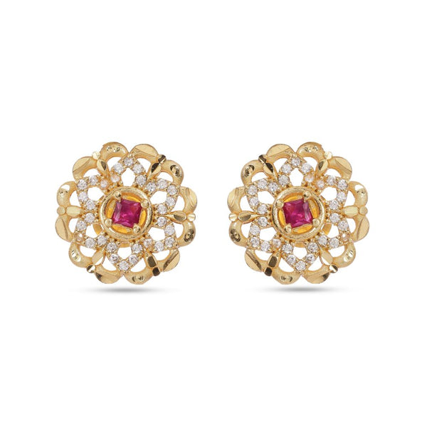 Pair of gold earrings with red gemstones and diamond-like stones on a white background
