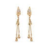Gold skull earrings with dangling elements on a white background