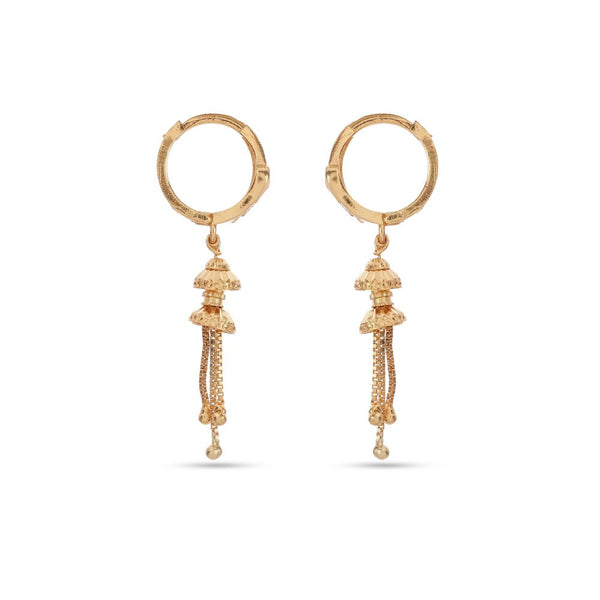 Gold hoop earrings with dangling gold beads on a white background