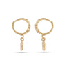 Gold hoop earrings with dangling elements on a white background