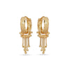 Gold hoop earrings with dangling elements on a white background
