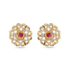 Pair of gold earrings with red gemstones and diamond-like stones on a white background