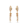 Gold earrings with dangling elements on a white background