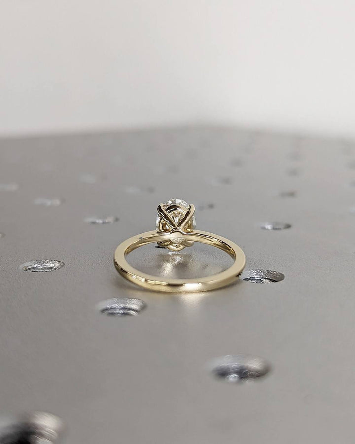 Marquise solitaire hidden halo